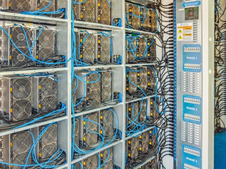 Nebraska partner site: ASIC racks and three-phase distribution inside a hall