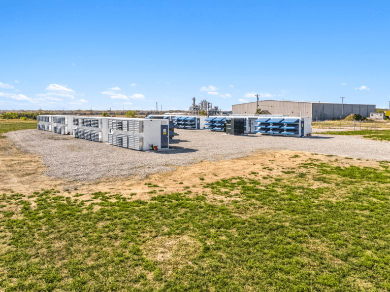 Nebraska partner site: mining containers with industrial plant in the background